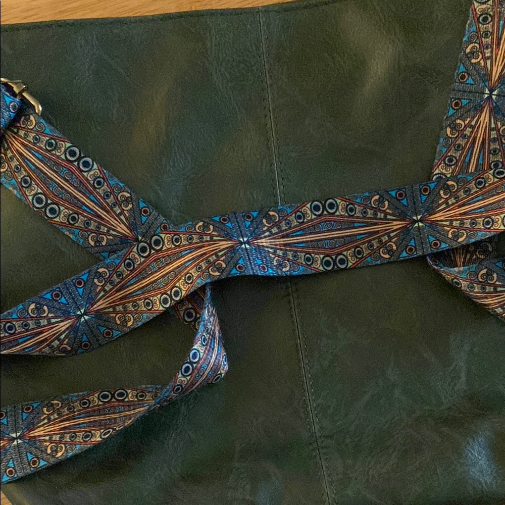 Vintage-Inspired Green Leather Tote with Patterned Strap
